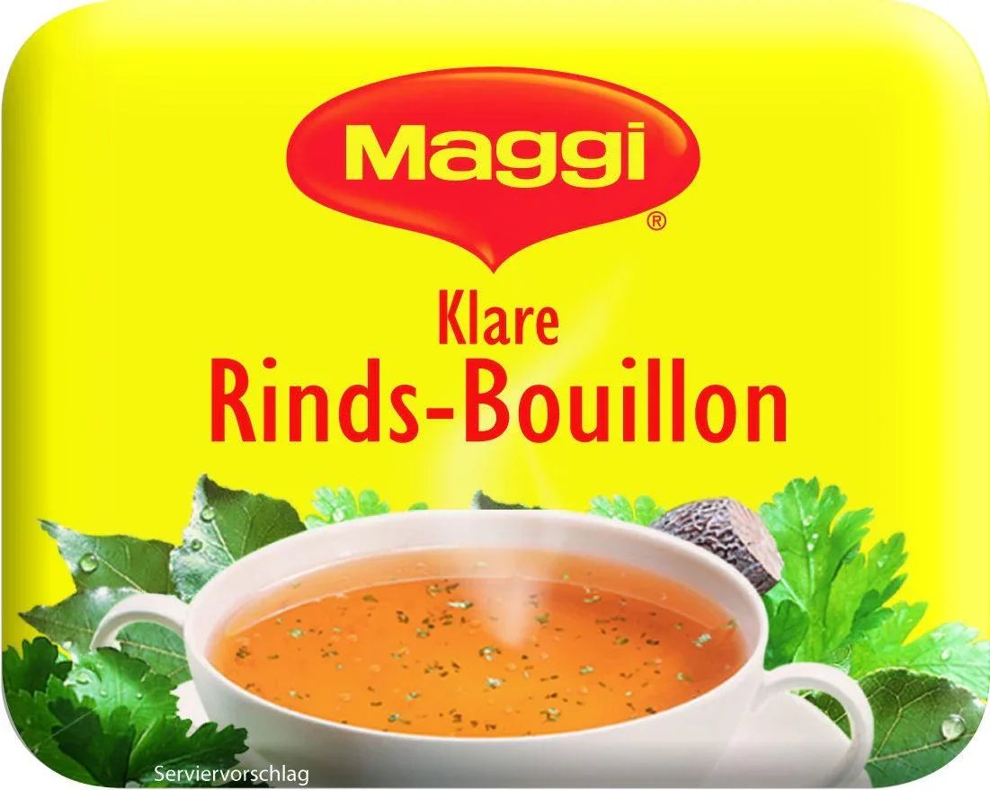 Maggi Klare Rinds-Bouillon Packung mit Suppe und frischen Kräutern auf gelbem Hintergrund